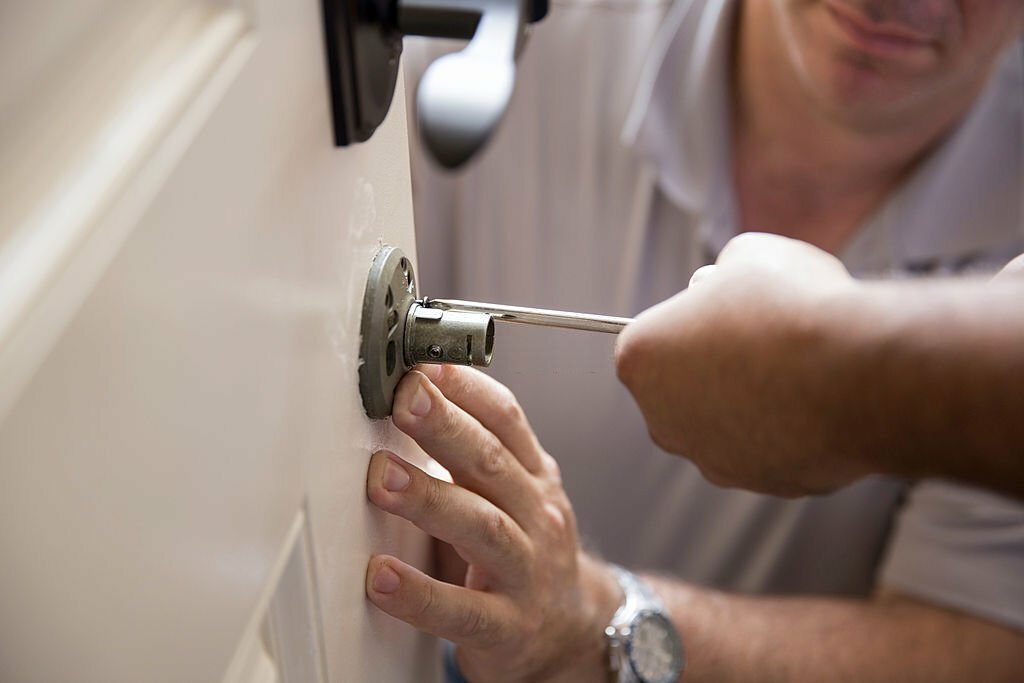 Installing a lock and security system.  rr